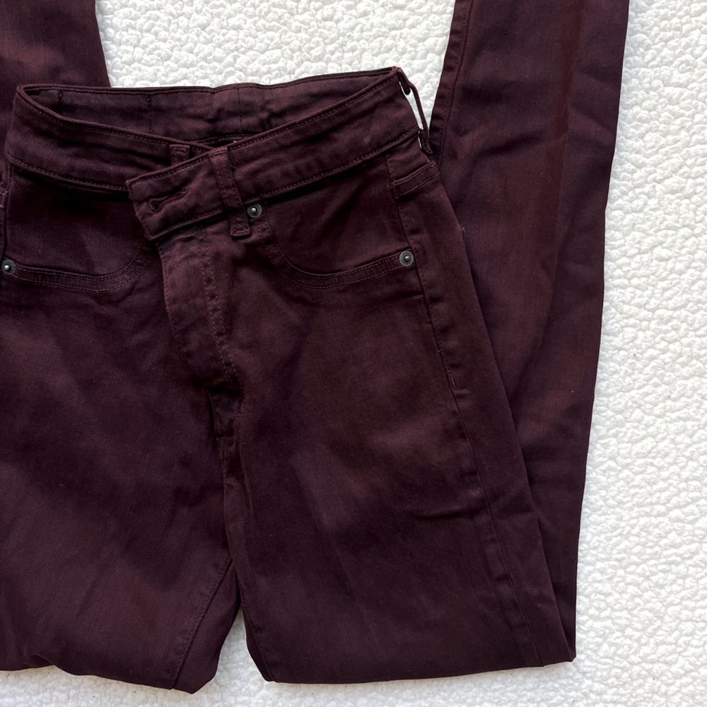 Maroon ripped skinny jeans